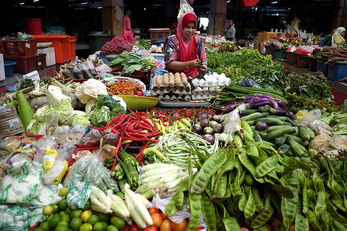 Malay lady selling her vegetables