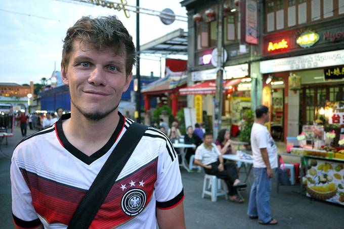 Colin at the night market in his Germany shirt