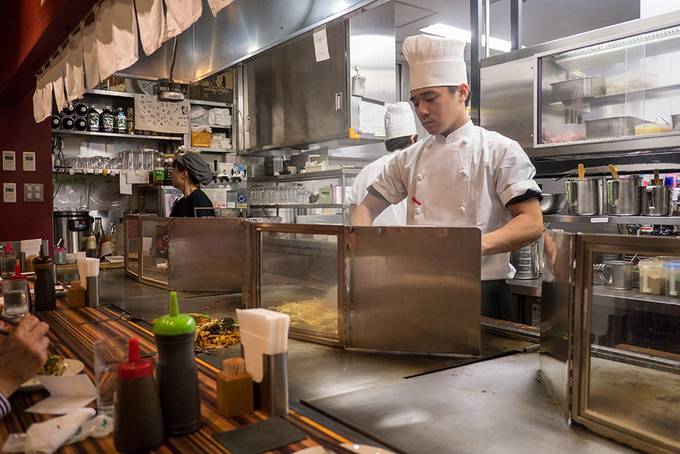 Grilling the okonomiyaki