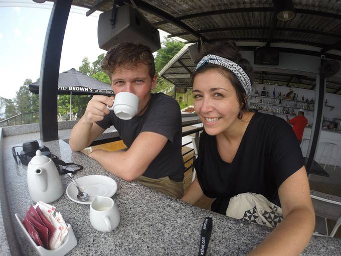 couple smiling and drinking tea