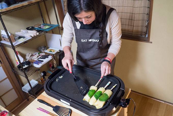 Making chopstick okonomiyaki